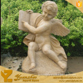 yellow stone reading book boy nude angel statues for garden decoration